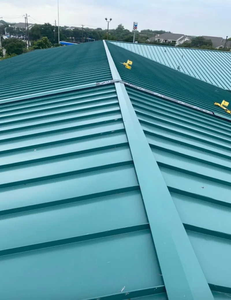 Green commercial metal roof ridge and valley for Metal Roof Repair in Taos
